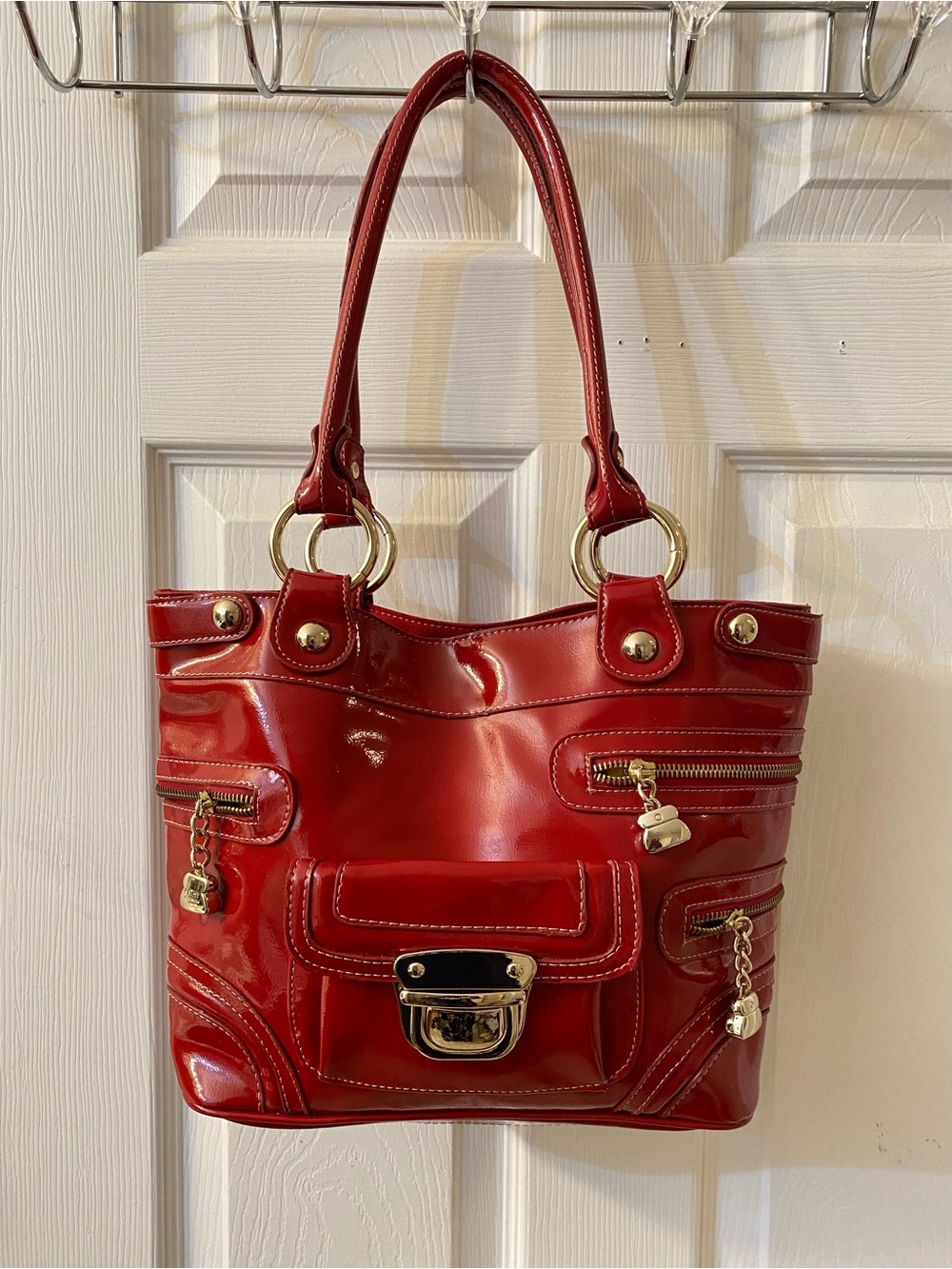 NEW….Kathy Van Zealand, New never used beautiful patent glossy Red Leather